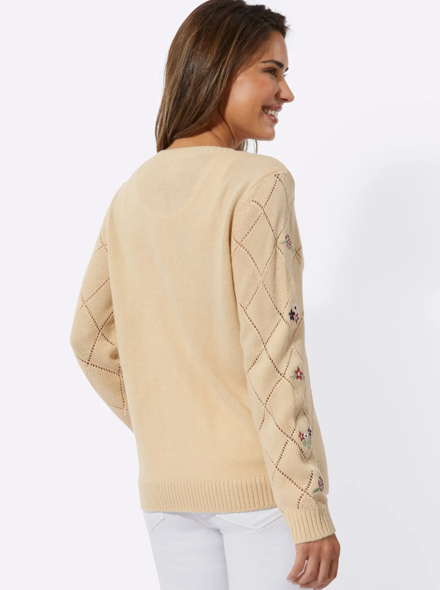 Ajourstrickjacke mit Blütenstickereien