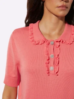 Polopullover mit kurzer Zierknopfleiste