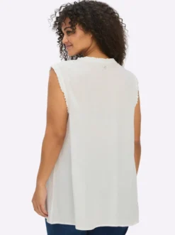 Ärmellose Bluse mit Rüschen und Stickerei