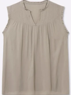 Ärmellose Bluse mit Rüschen und Stickerei