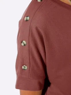 Sweatshirt mit Zierknöpfen an der Schulterpartie